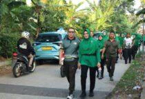 Dandim 0506/Tgr Kolonel Inf Ary Sutrisno bersama Ketua Persit KCK XX Fitria Sutrisno Olahraga Bersama Jaga Kebugaran Prajurit dan Keluarga Besar Kodim