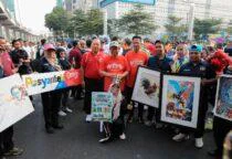 Buka HBKB Rasuna Said, Gubernur DKI Jakarta Pramono Anung menyapa dan mengajak Warga Budaya pilah sampah di Jl. HR. Rasuna Said, Setiabudi, Jakarta Selatan, Minggu (7/6/2026).