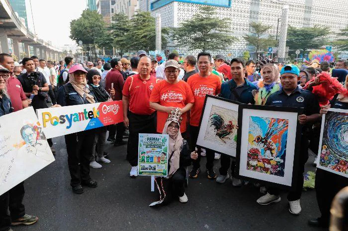 Buka HBKB Rasuna Said, Gubernur DKI Jakarta Pramono Anung menyapa dan mengajak Warga Budaya pilah sampah di Jl. HR. Rasuna Said, Setiabudi, Jakarta Selatan, Minggu (7/6/2026).