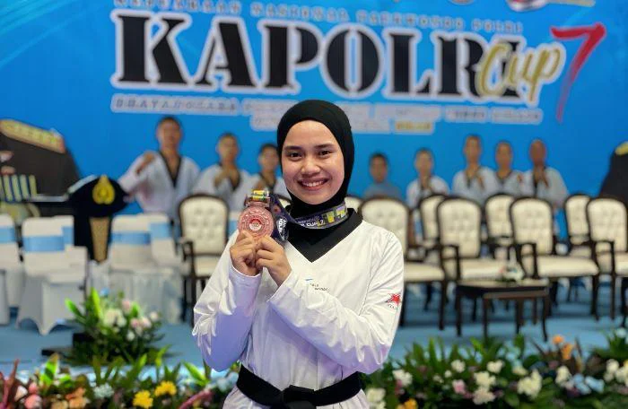 Bripda Yeni Artha Aulia, yang berhasil meraih dua medali perunggu pada ajang Kejuaraan Nasional Taekwondo Kapolri Cup VII Tahun 2026, Tangerang, Senin, (13/07/2026).
