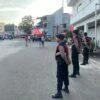 Polisi Pastikan Free Day Bundaran Satam Berlangsung Aman dan Lancar dipimpin oleh IPDA Solihin Sastra selaku pengambil apel. Tanjungpandan, Minggu (19/7/2026).